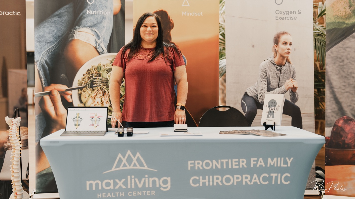Vendor representative at a corporate health and wellness booth